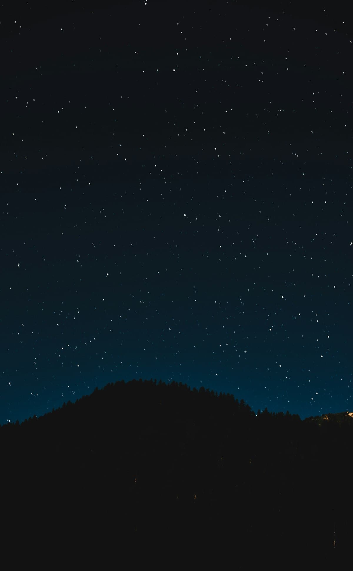 Golden sunset over calm waters symbolizing the completion and closure of angel number 999