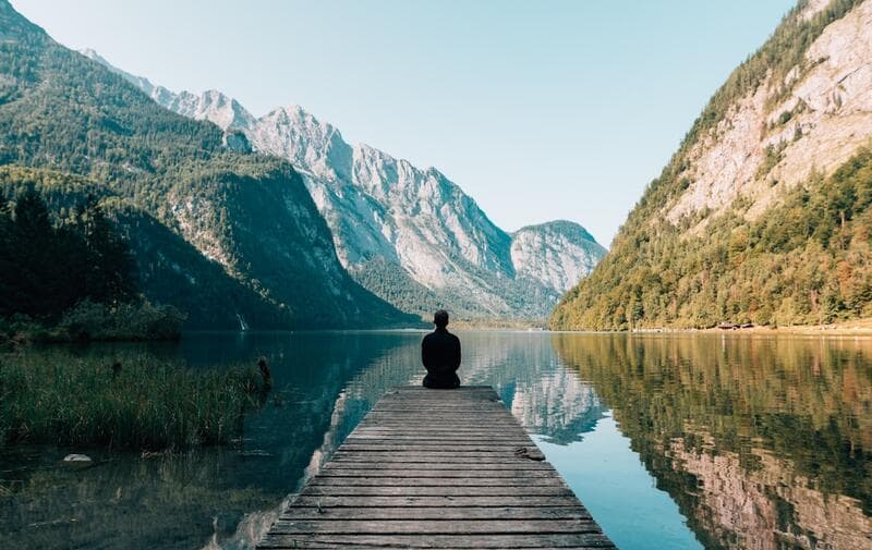 Meditation scene with golden light representing spiritual awakening and higher consciousness of 1010