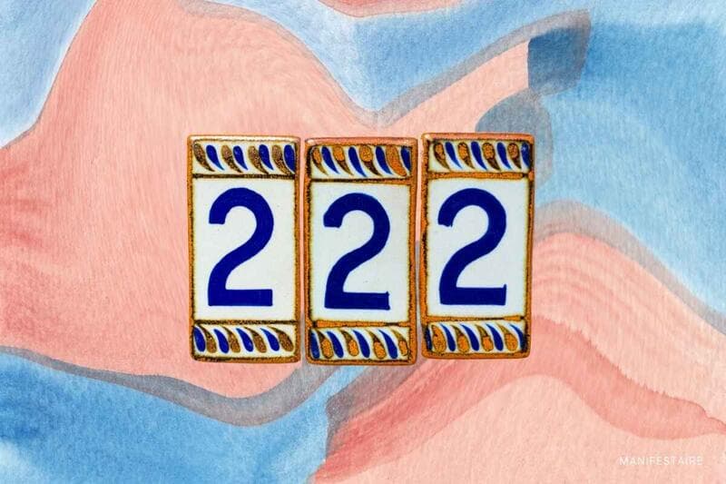 Sunrise over calm waters representing divine timing and patience of angel number 222
