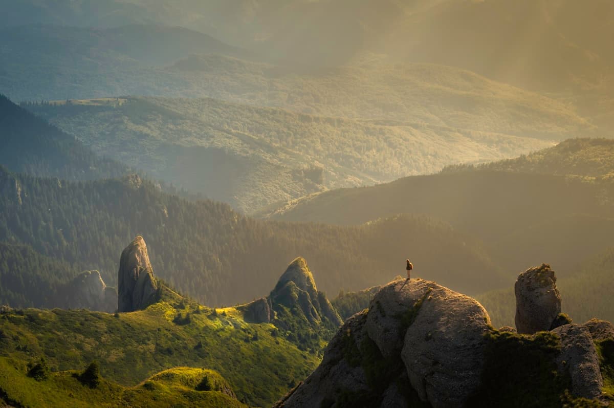 Mountain sunrise vista symbolizing freedom, adventure and new beginnings of 555